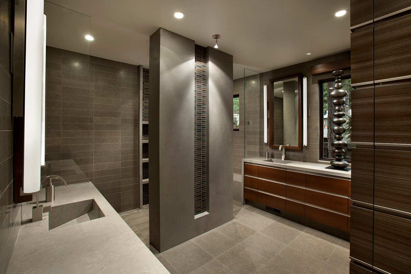 Elements of stone and wood in a Contemporary bathroom