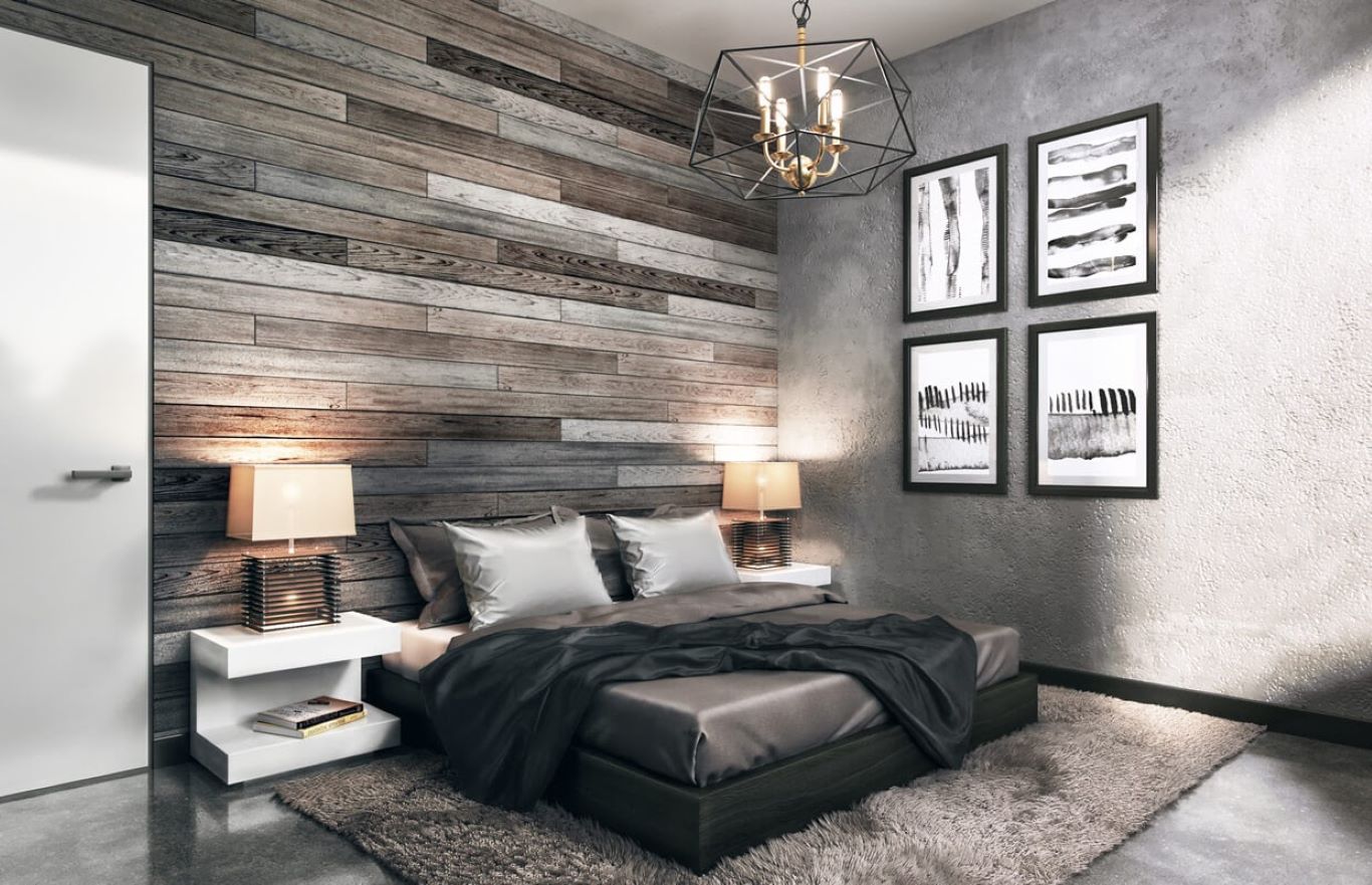 A platform bed leaned against rustic pallet wood wall, complemented with sconce lighting at bedsides