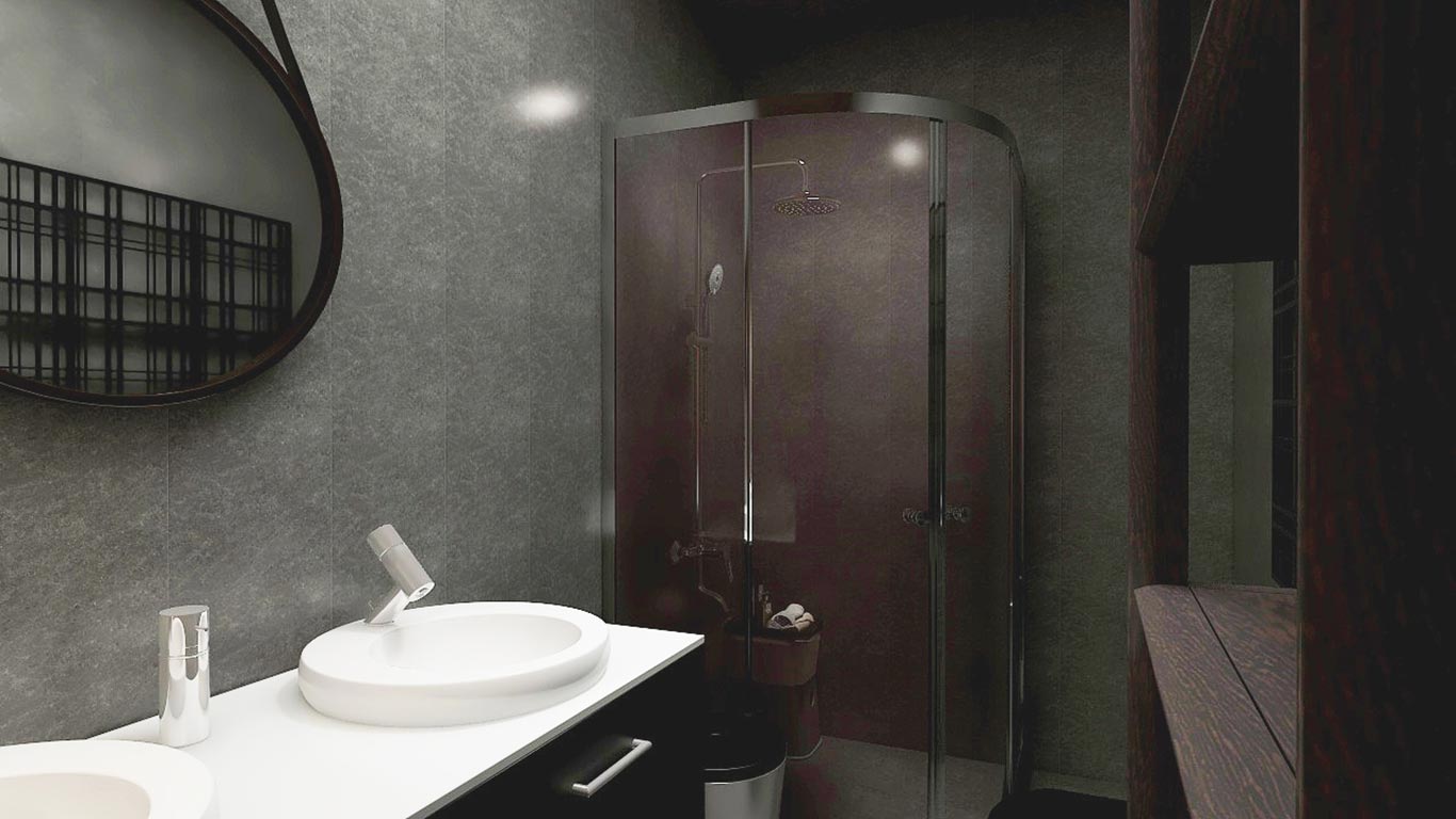 Ceramic basin and its countertop polished white to contrast with dark wood and black accents around the bathroom