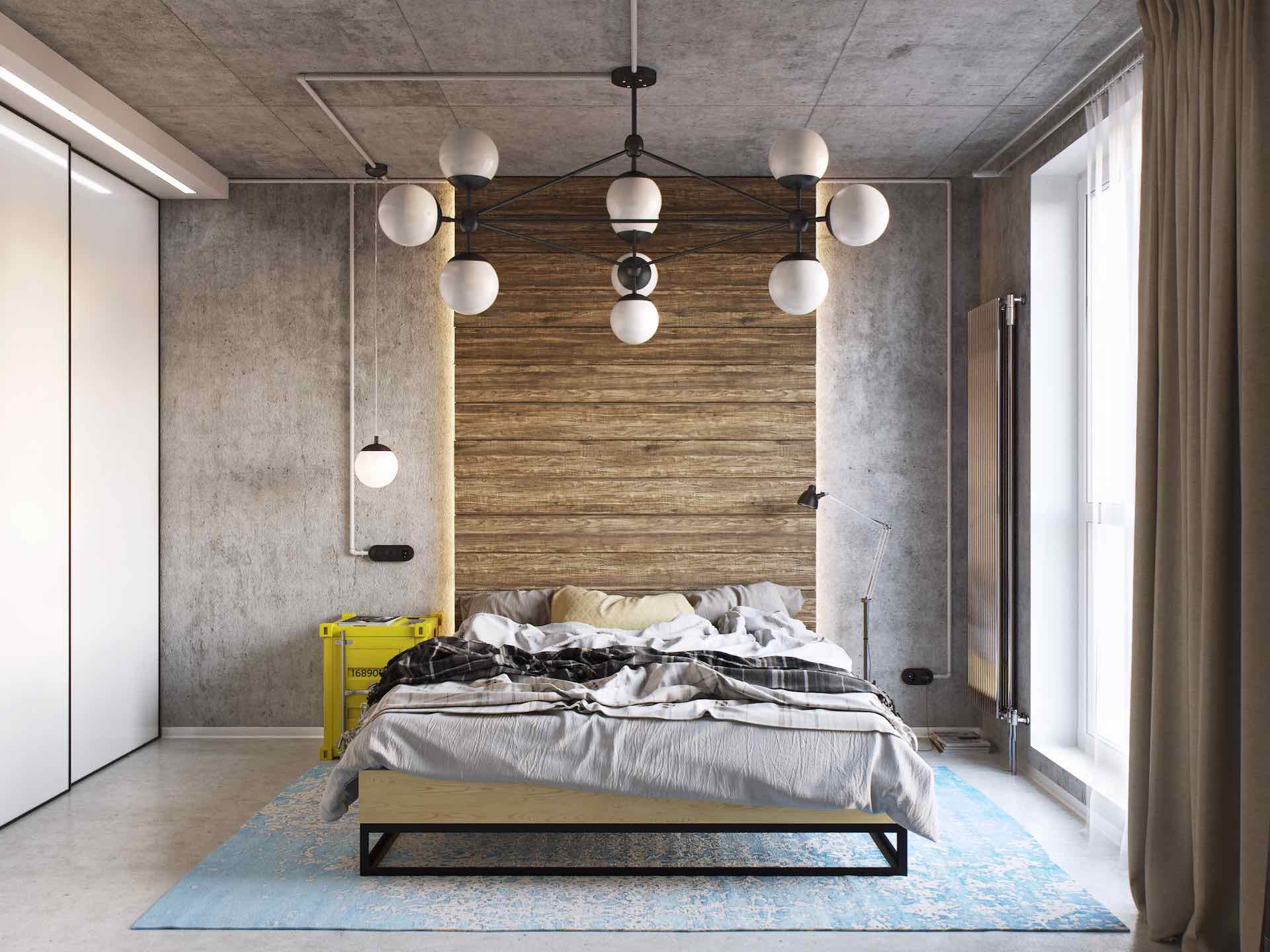 A modern sputnik chandelier pendant light stood out against the concrete flooring and ceiling