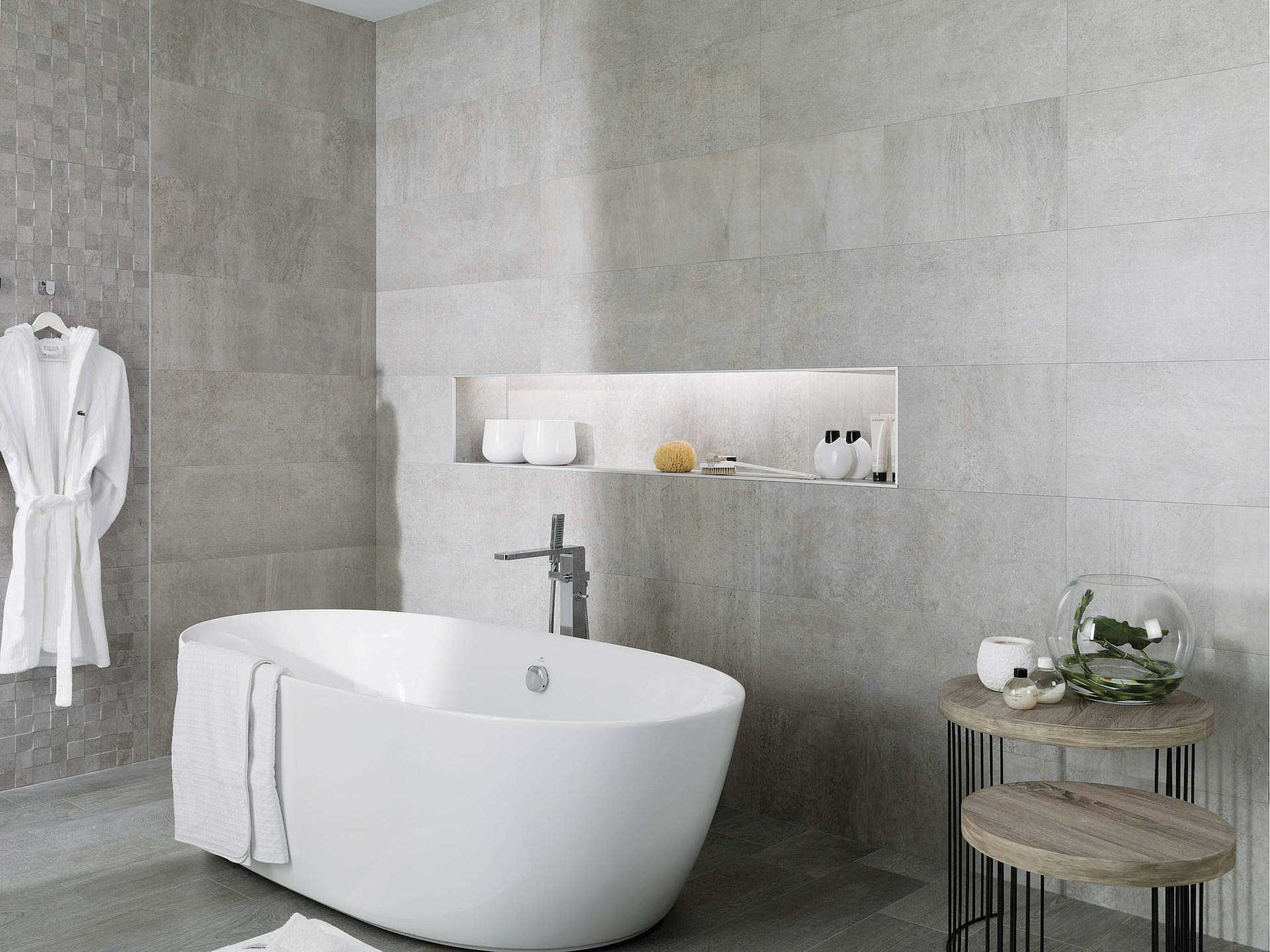 3D cube modular carved in natural gray stone accent contrast against its neighbouring granite wall