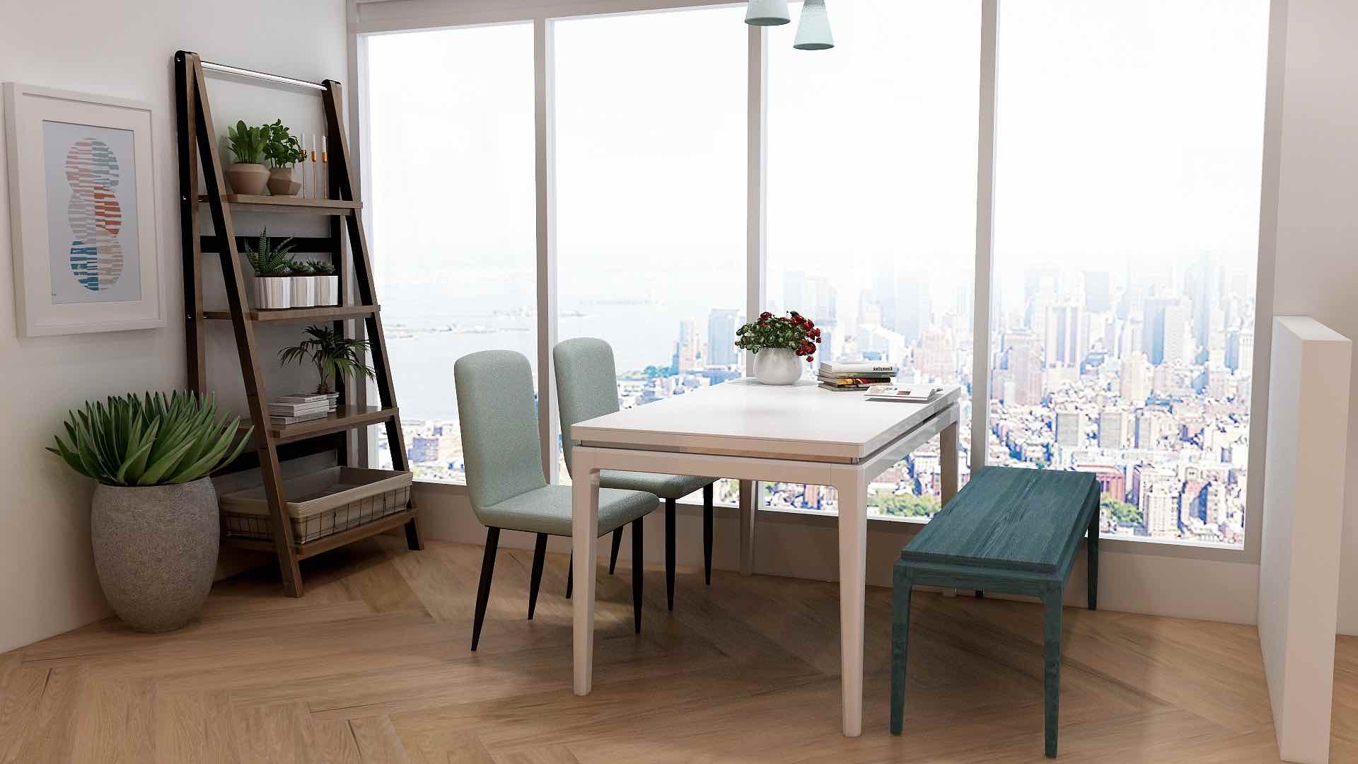 White dining table with blue chairs and plant decor beside a large window