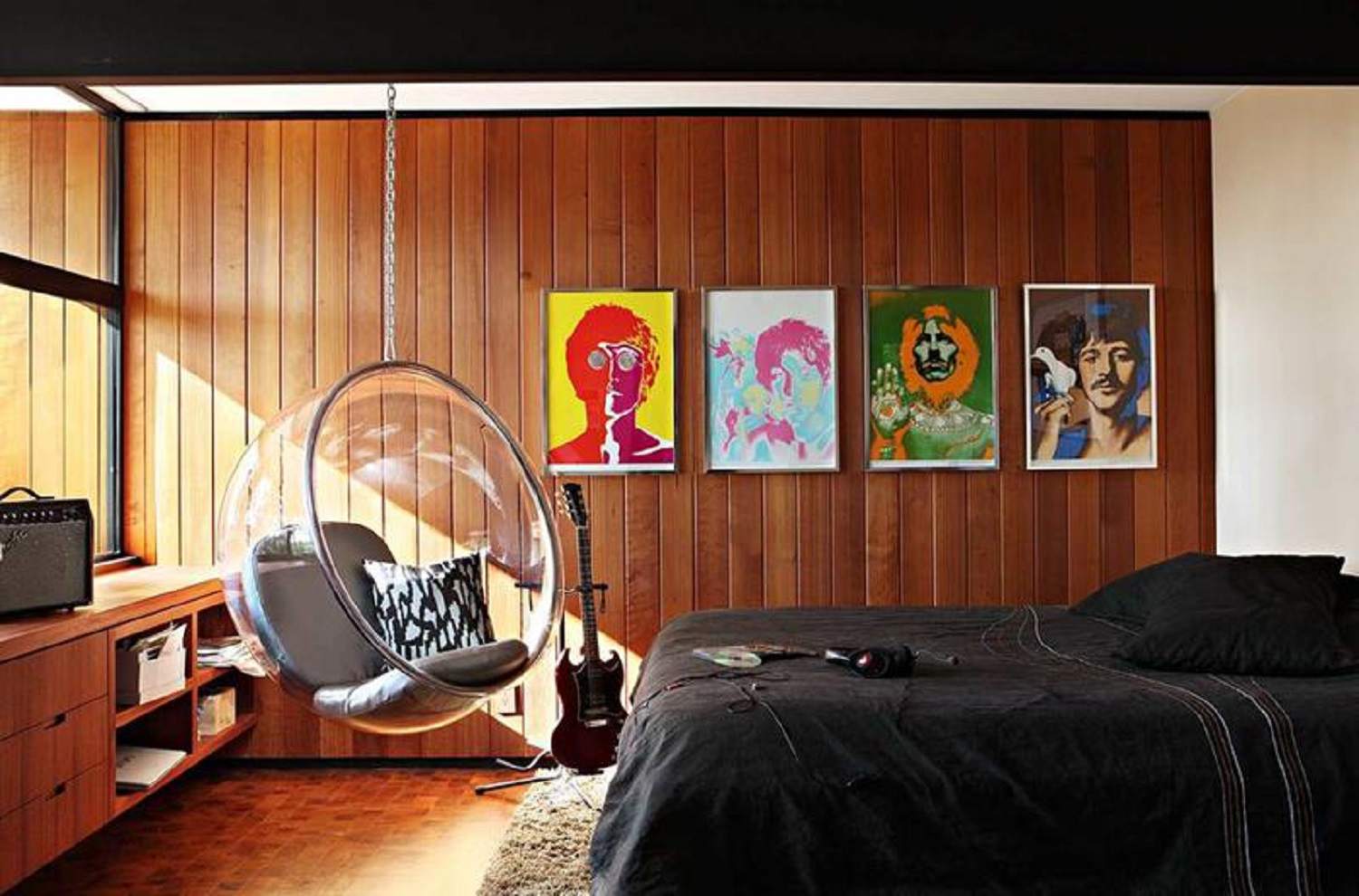 Pop art graphics and acrylic bubble chair adds a fun element to the modern Retro interior setting