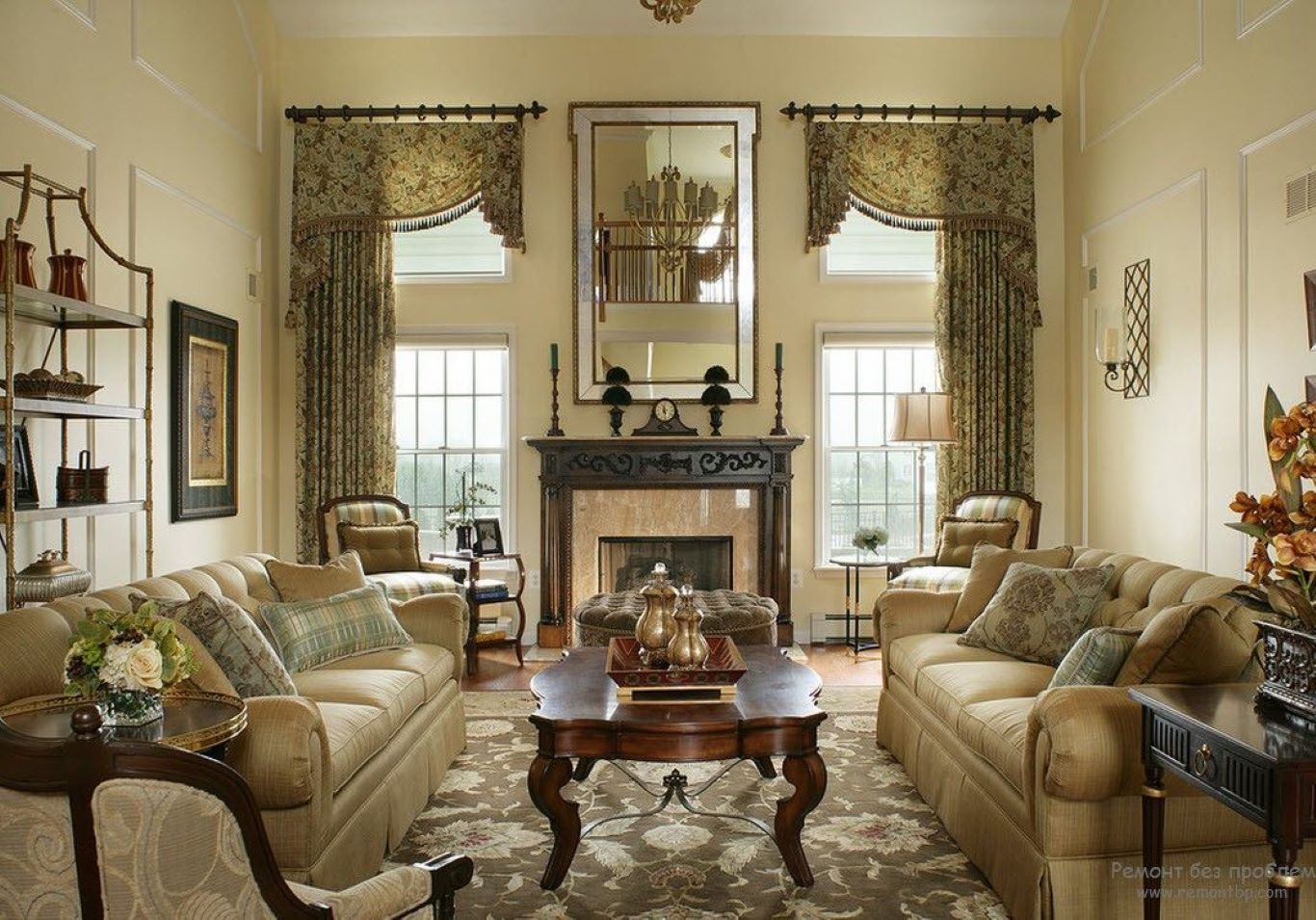 Carved wooden coffee table and patterned fabric sofas complement embellished window curtains.