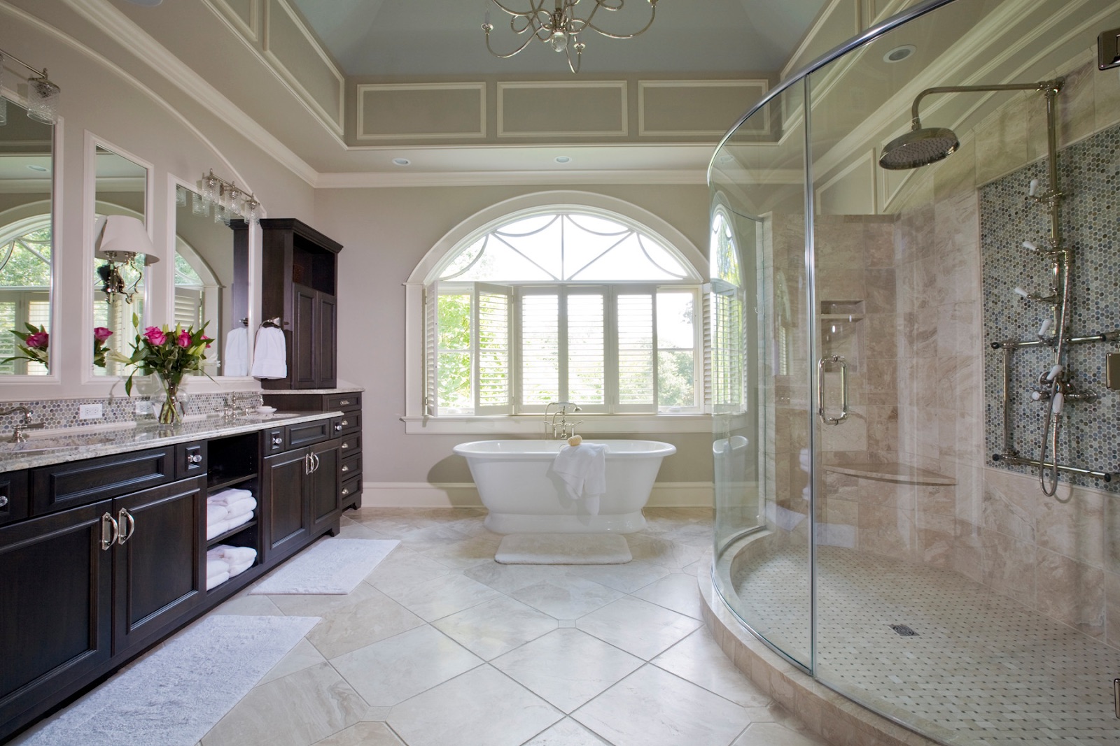 Large bathroom with stand-alone bathtub in the center.